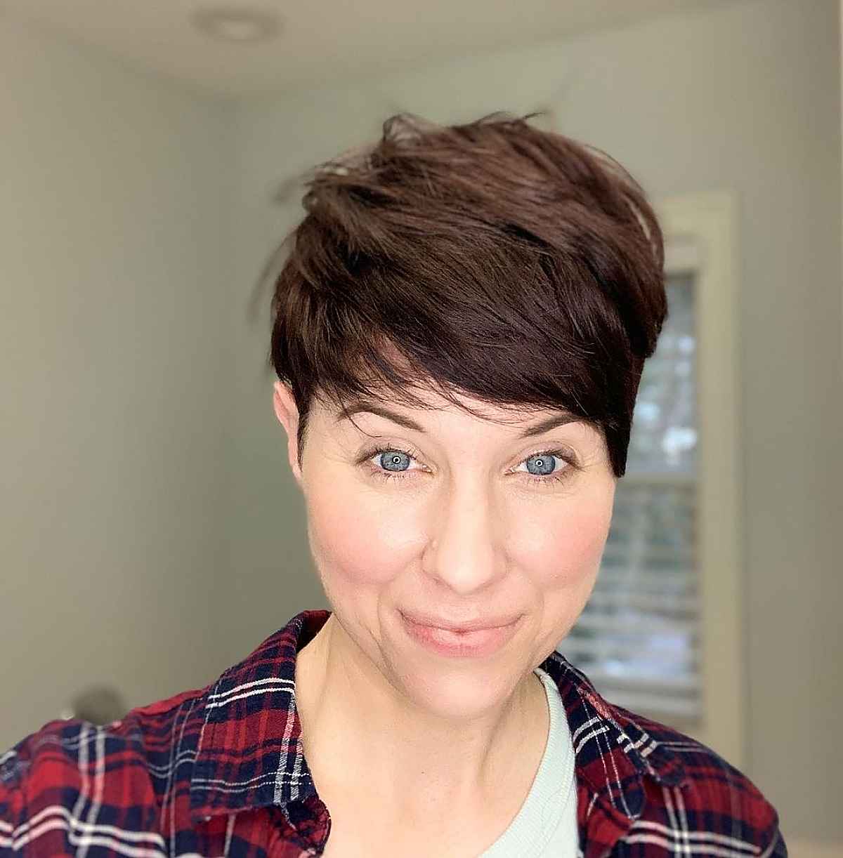 pixie for older ladies over 40 with subtle layers for thick hair