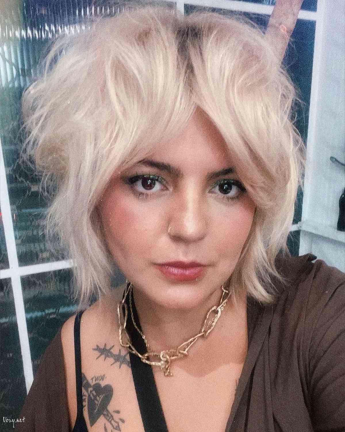 platinum short fluffy shag with curtain bangs