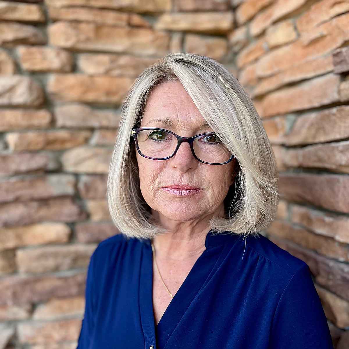 rounded bob cut for 60 year olds with glasses