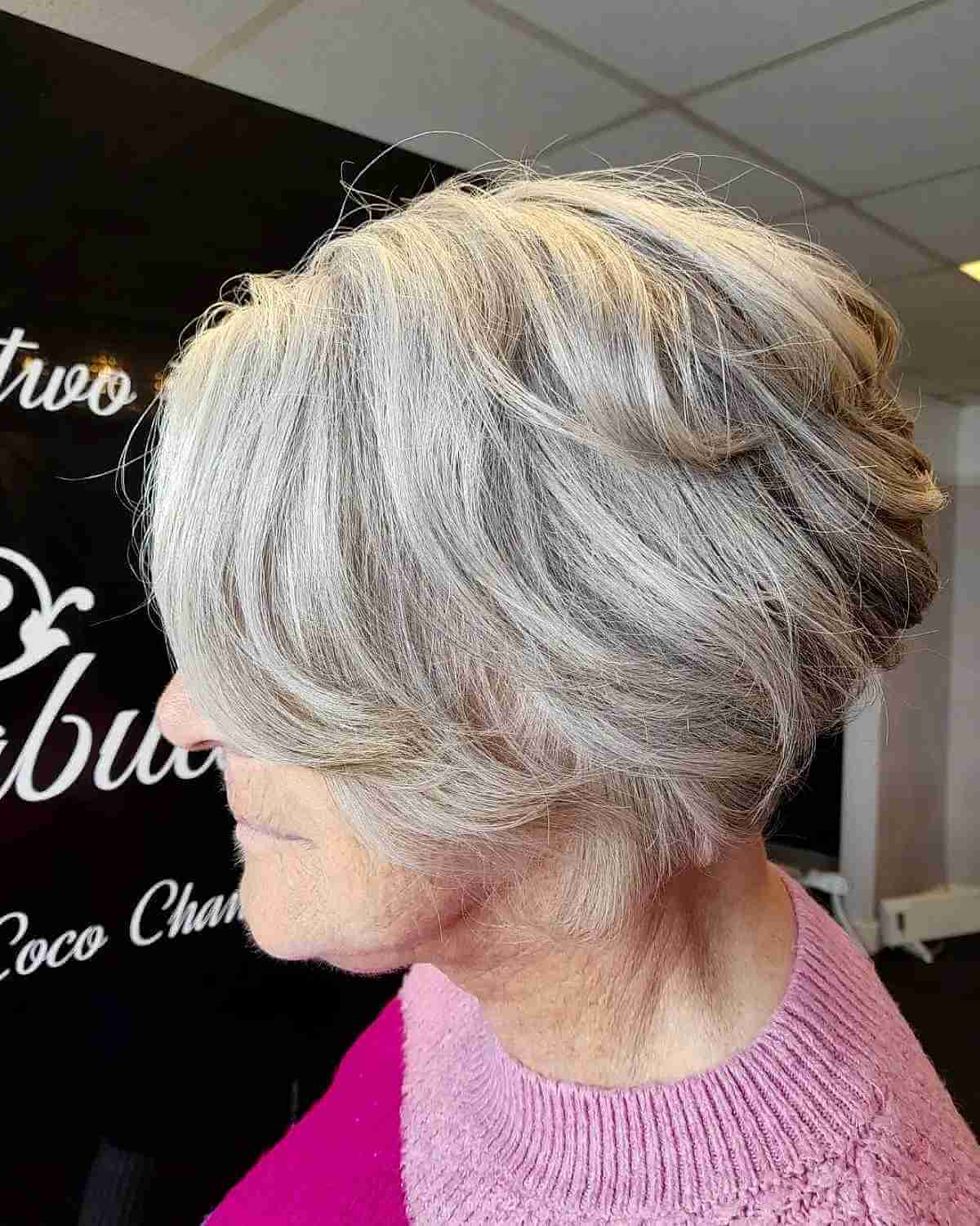 rounded bob with stacked layers for a 70 year old woman