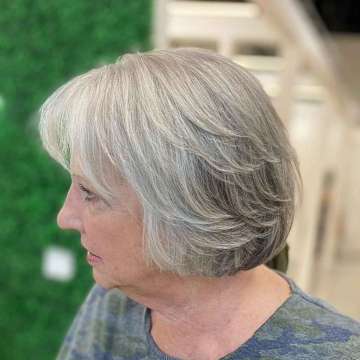 salt and pepper classic bob with bangs for ladies past seventy