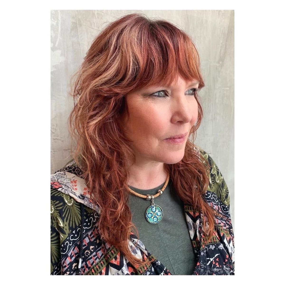 shag with curtain bangs for women 60