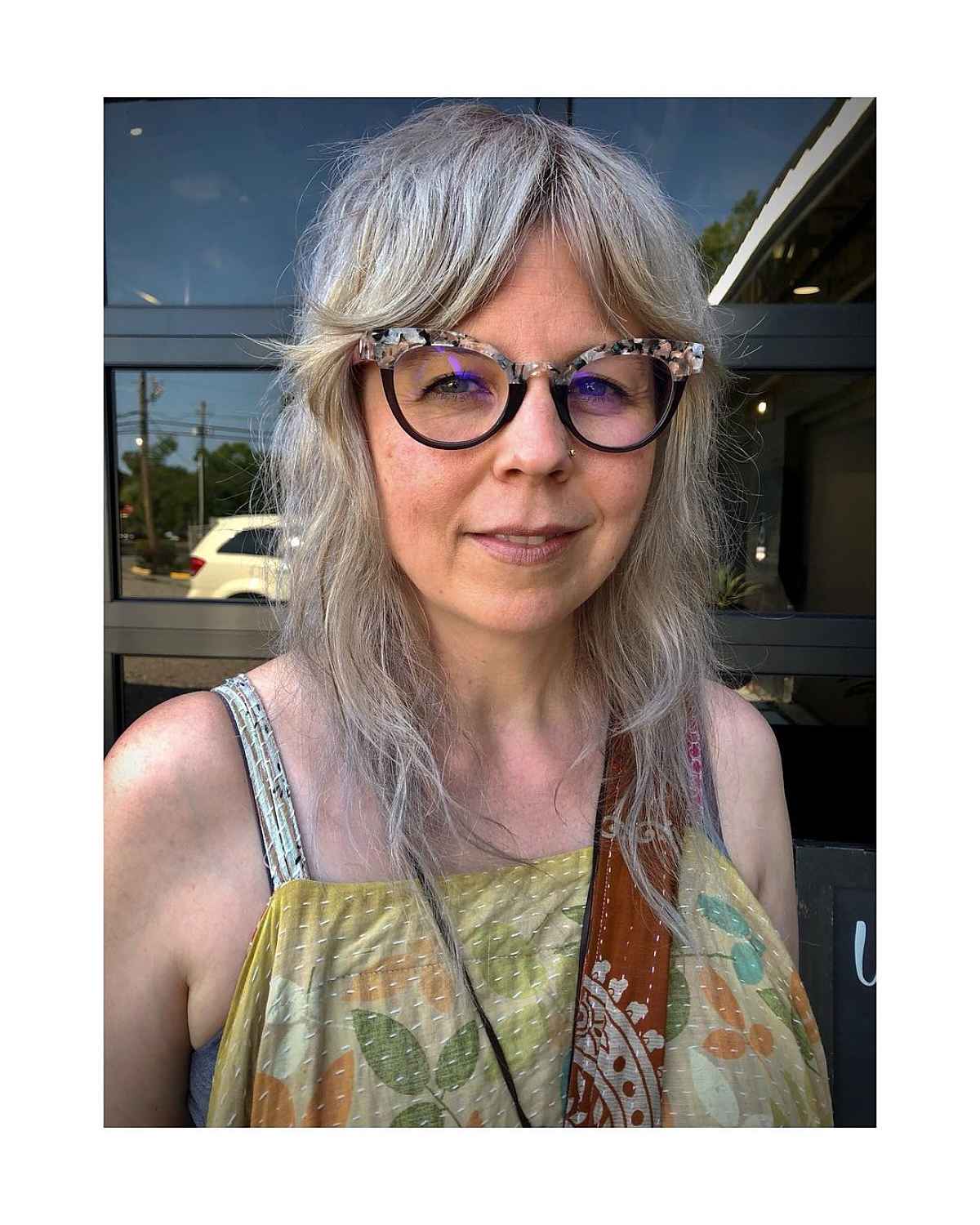 shag with parted bangs for women over 50