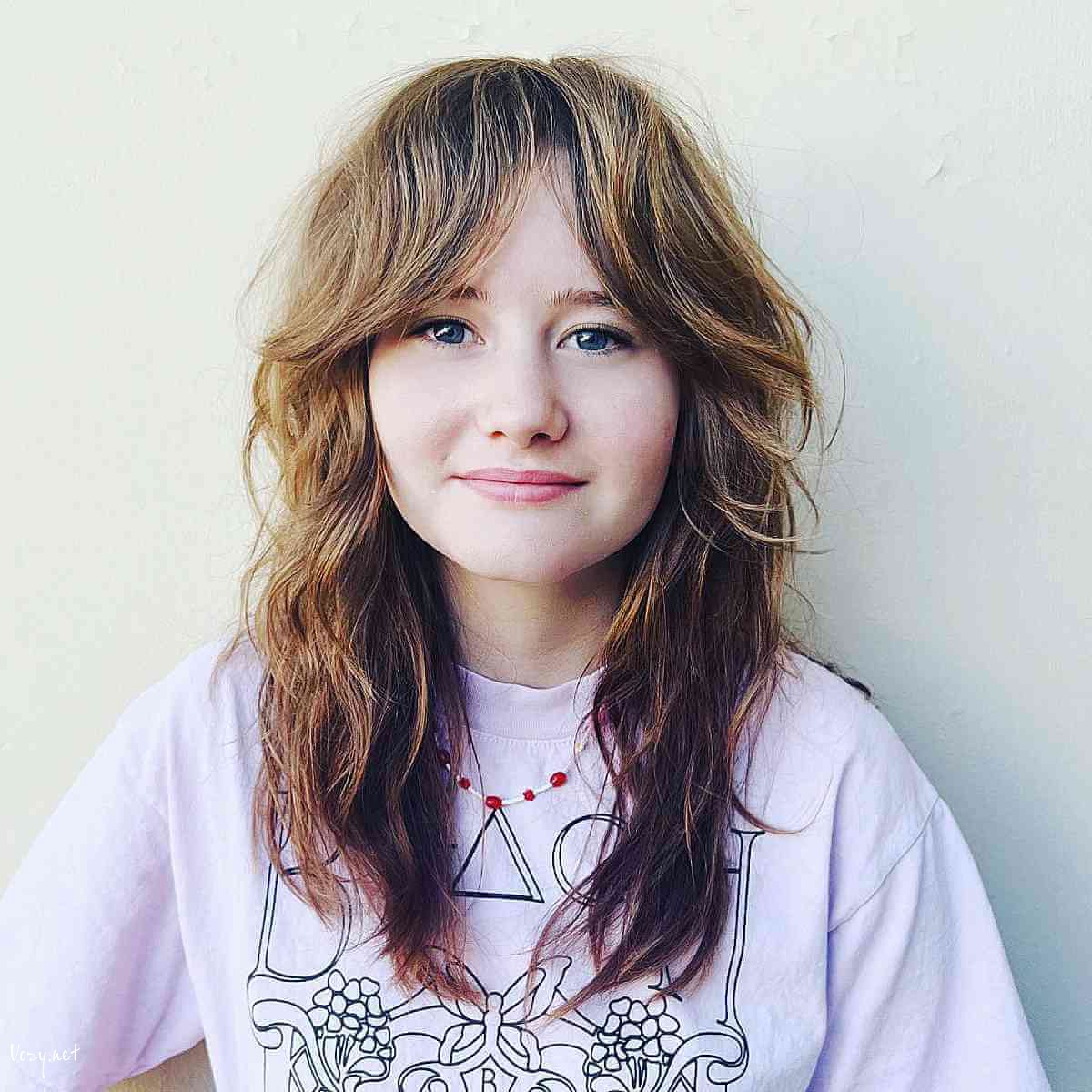 shaggy layers with reverse ombre and curtain bangs