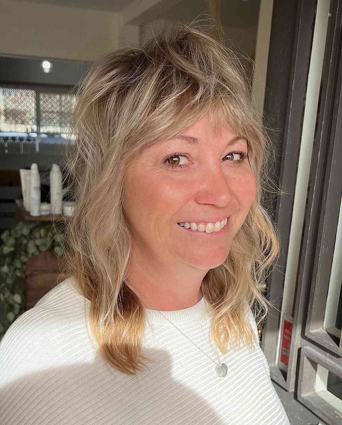 shaggy wolf cut with fringe for 50 year olds with fine hair