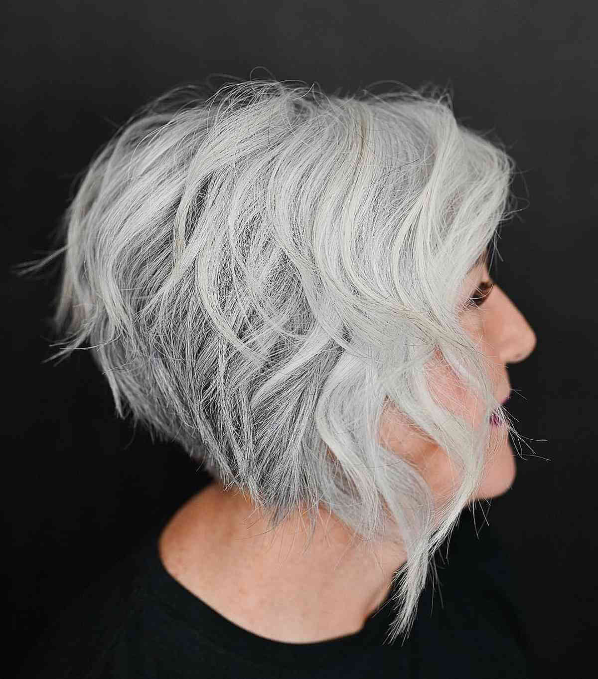 short and textured angled bob cut for 60 year olds
