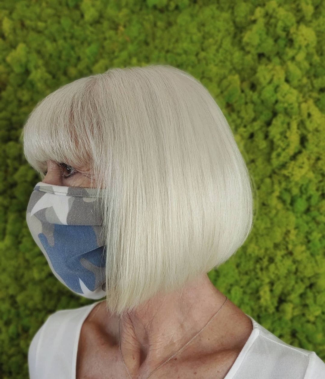 short angled bob with bangs for women over 70
