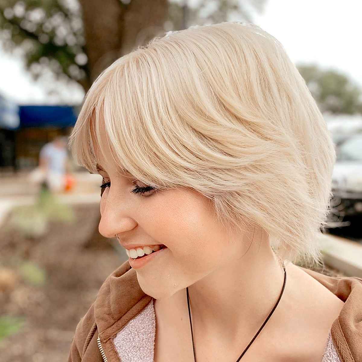 short bob with curtain bangs