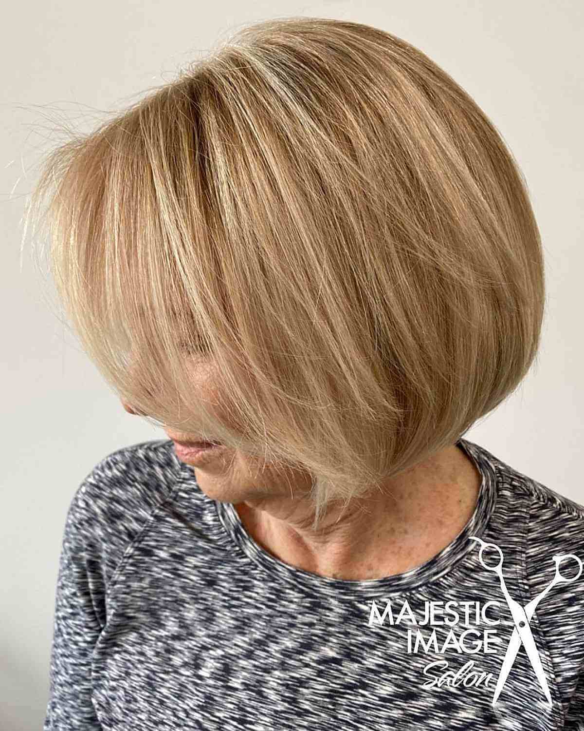 short bob with face framing layers on straight hair for women 70 and up