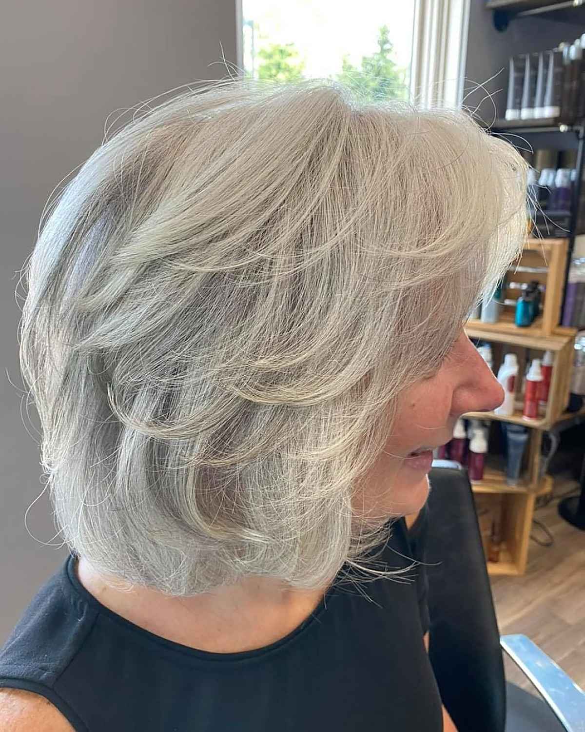 short bob with swoopy bangs for women aged 60