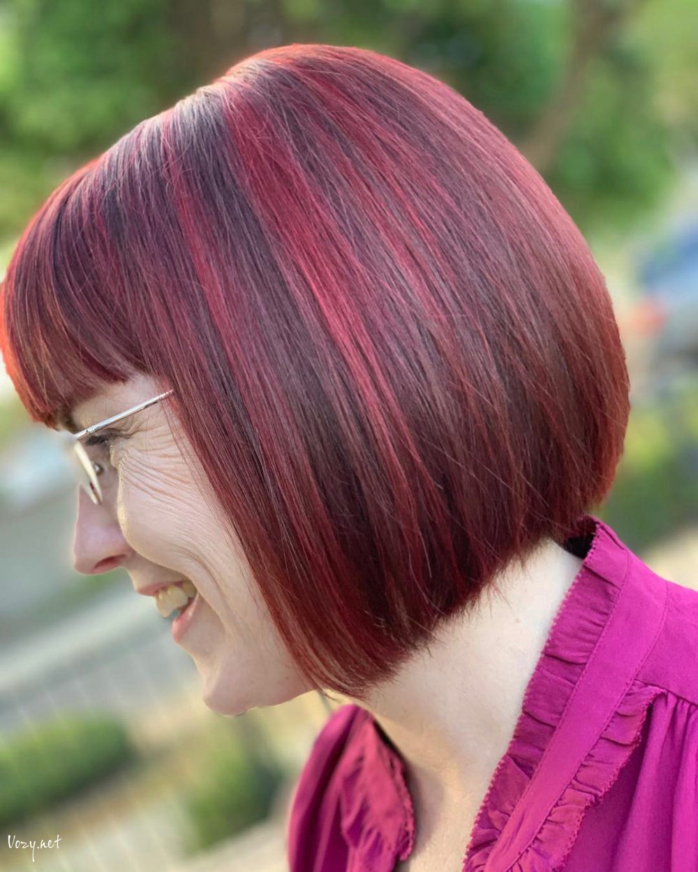 short chin length hairstyle for over 50 with glasses 1