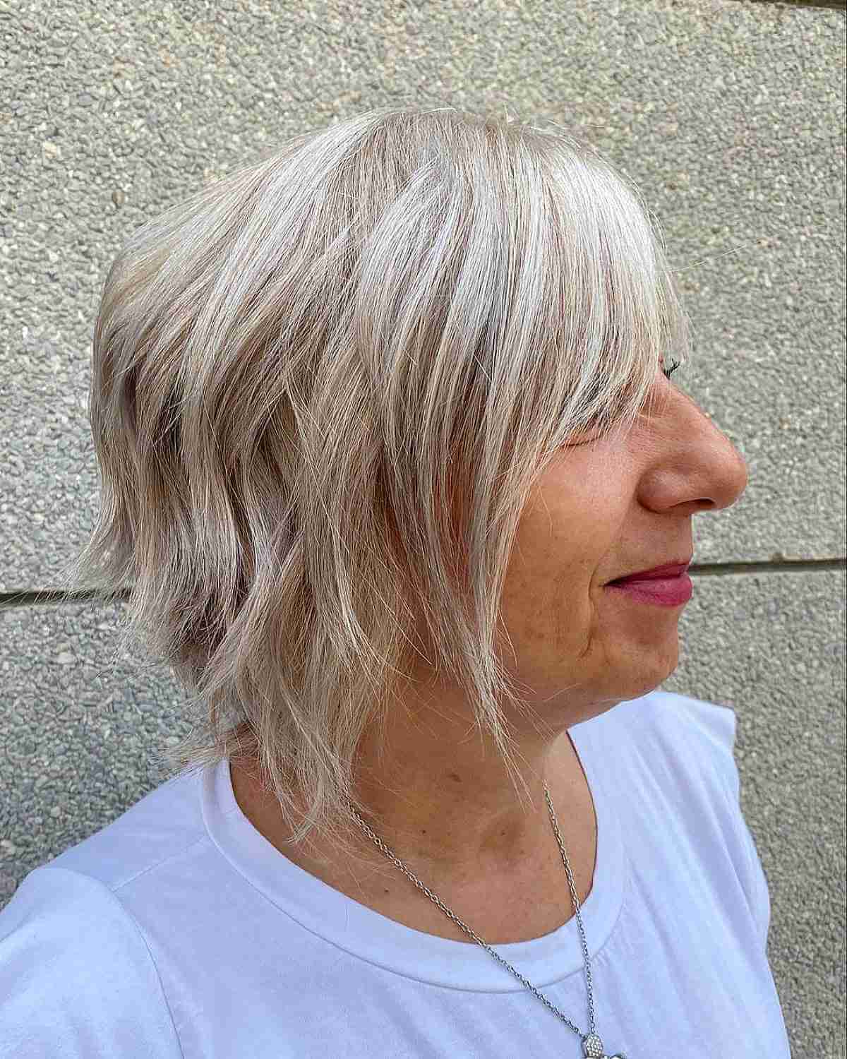 short choppy hair with blonde highlights and lowlights for old ladies
