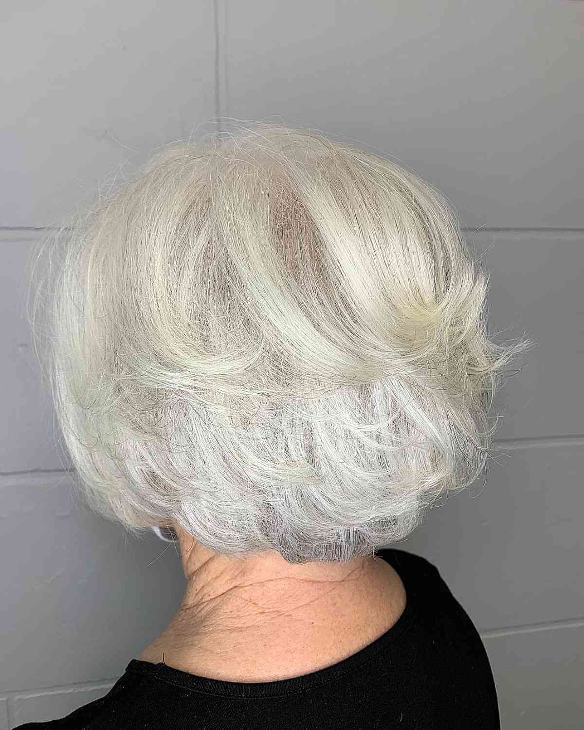 short feathered bob for thinning hair for seventy year olds