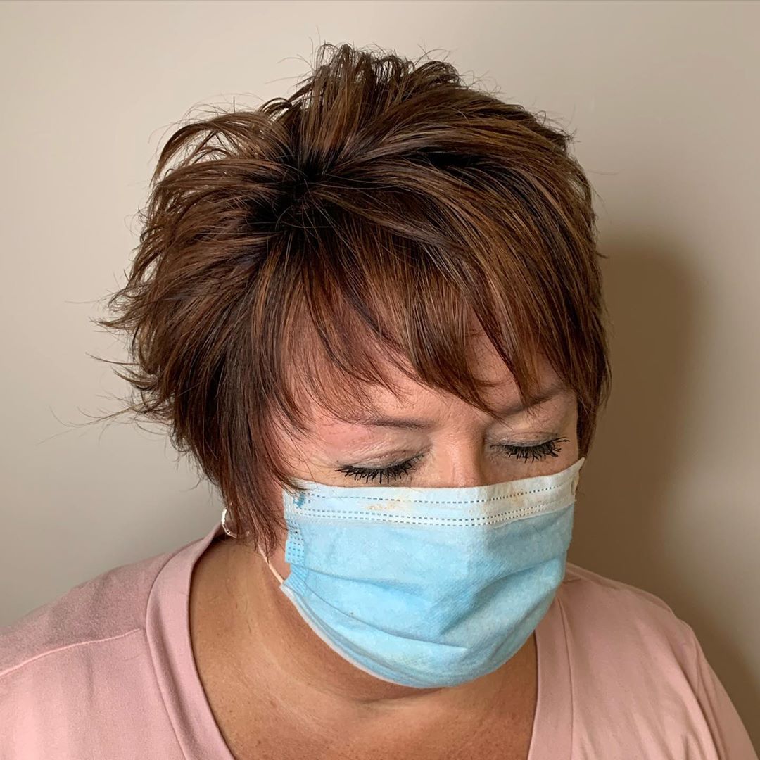 short haircut with wispy bangs for women over 50