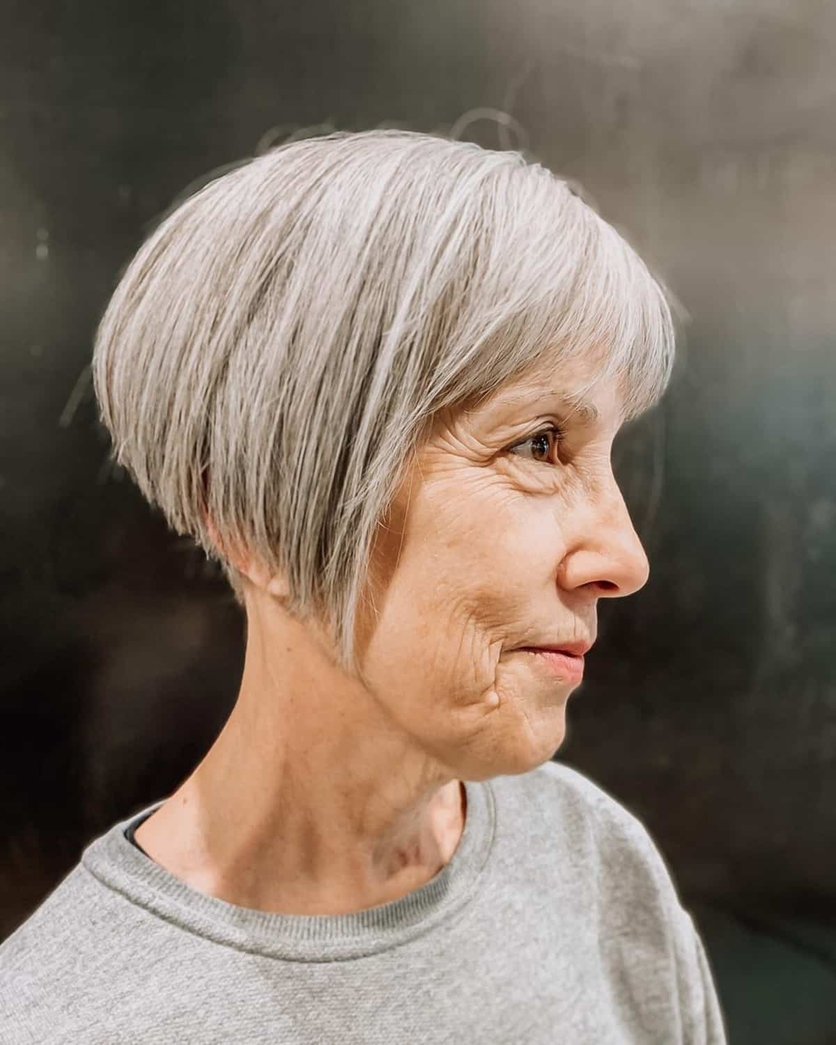 short hairstyle with bangs for over 50 women