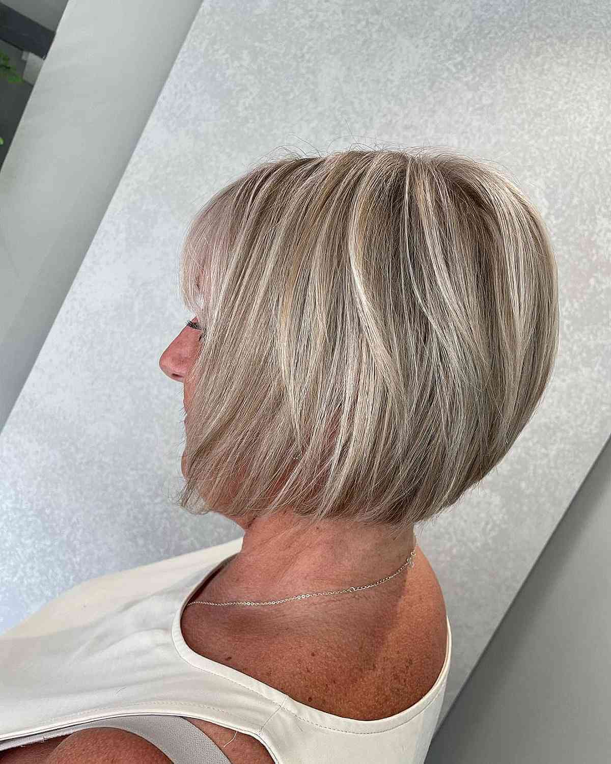 short layered bob for women over 50 with fine hair