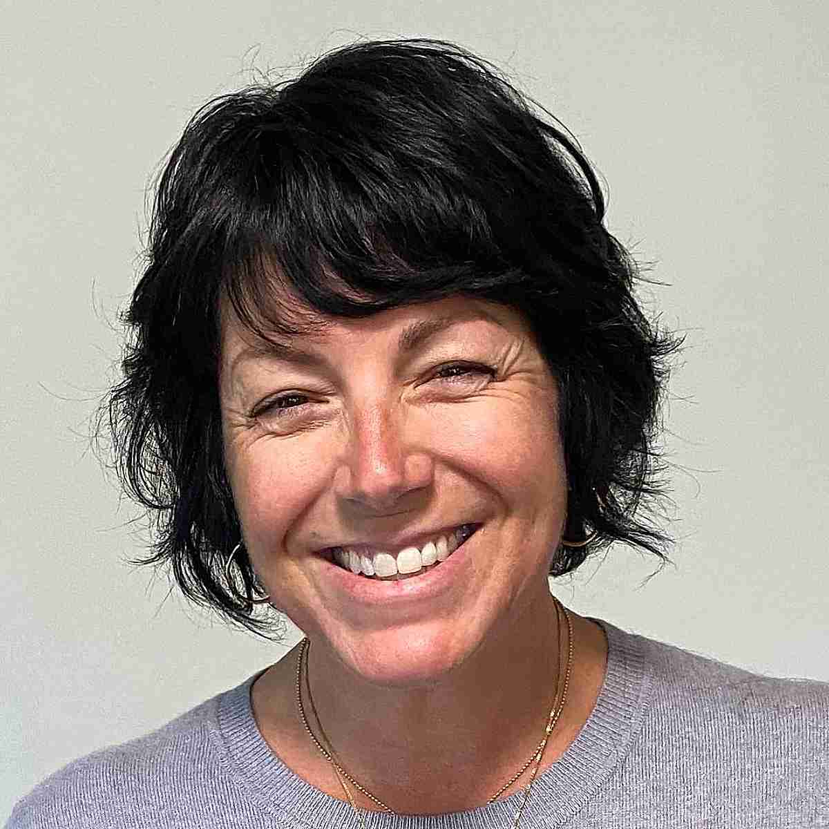 short layered mini bob with a fringe for ladies over 50
