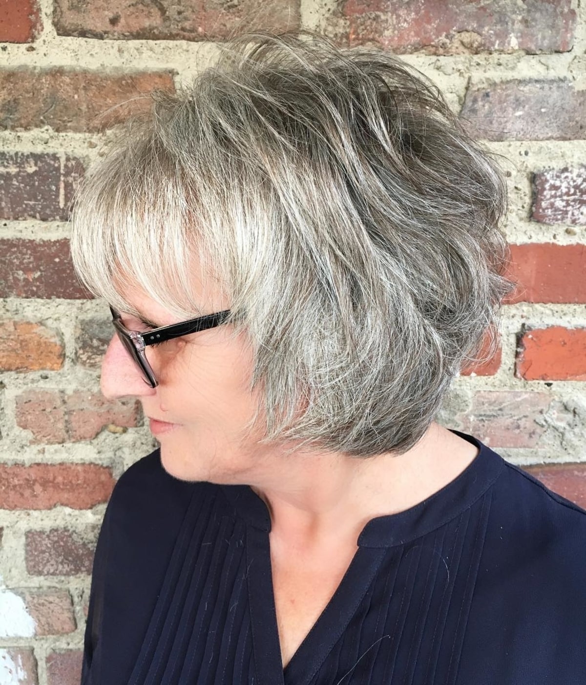 short shag cut for 60 women with glasses