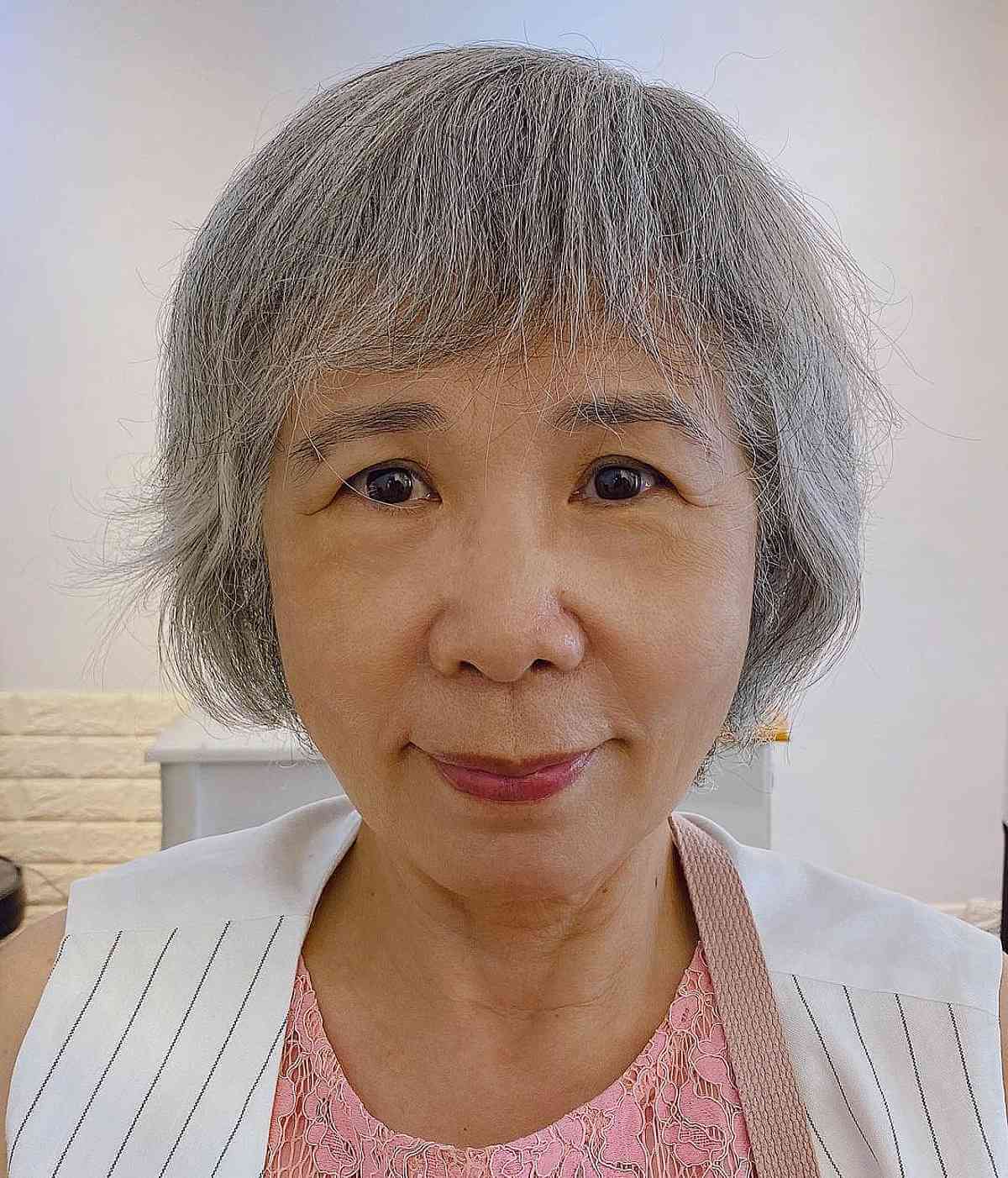 short silver wispy bob with wispy fringe for ladies 60 and over
