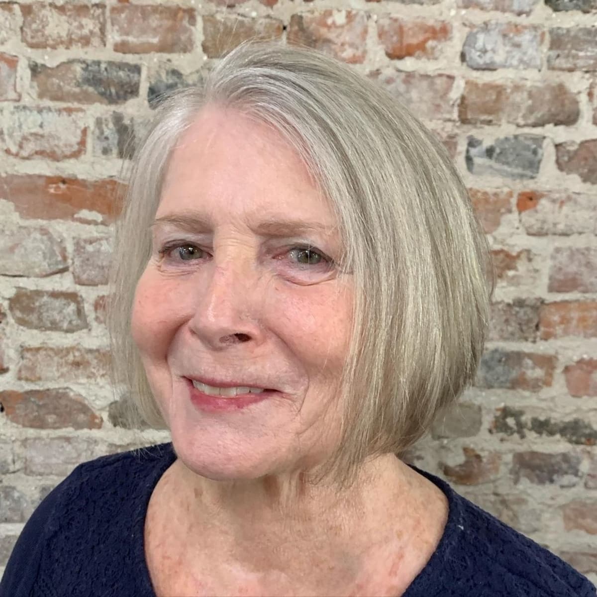 shorter hair style for a woman over 70 with silver hair
