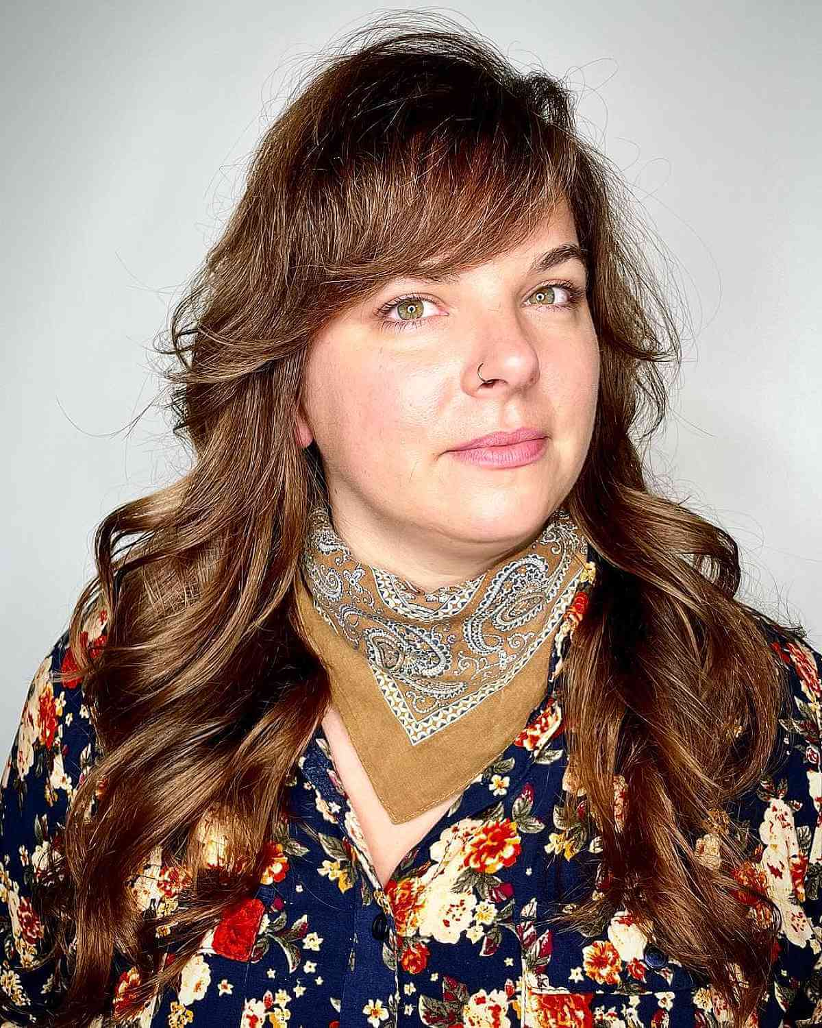 side swept bangs on long hair for fat faces in their forties