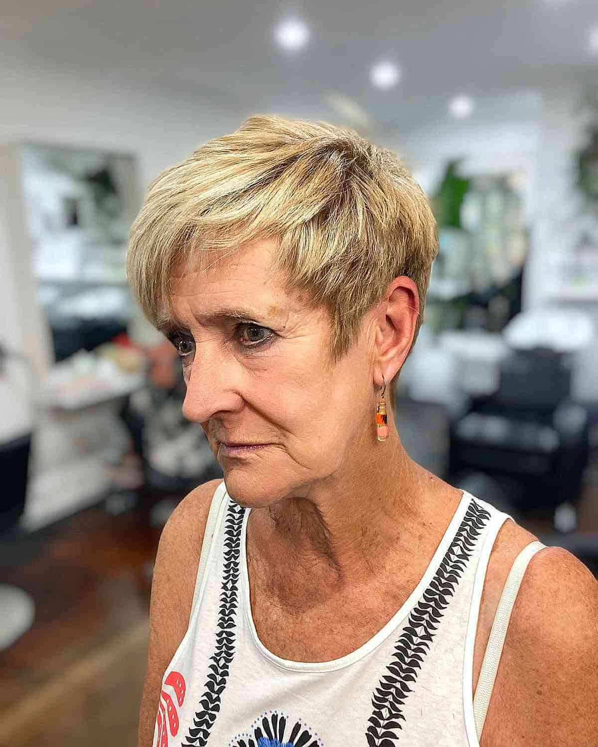 side swept choppy hairstyle for women 70 and over