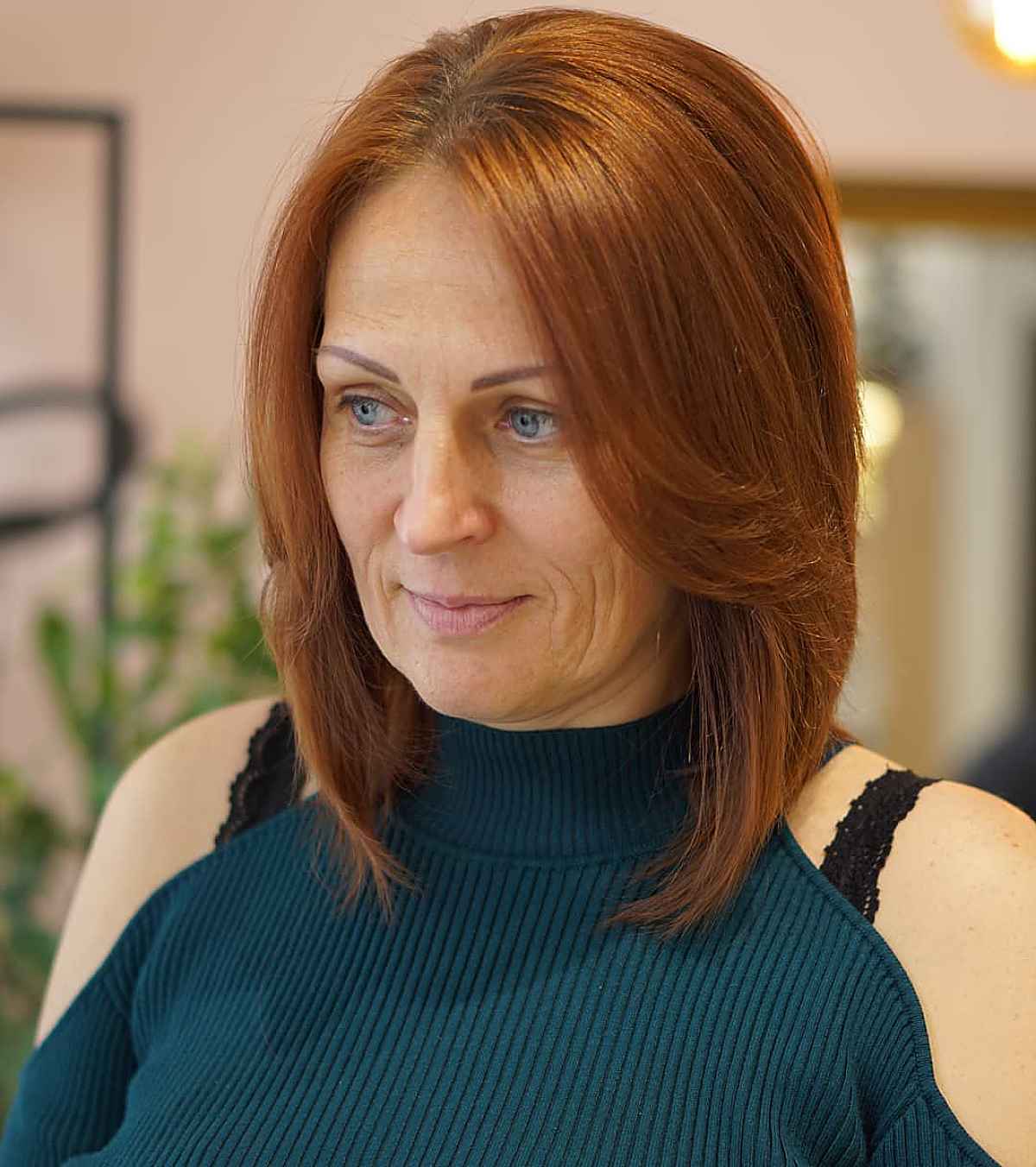 sleek ginger lob with layers for women over 60