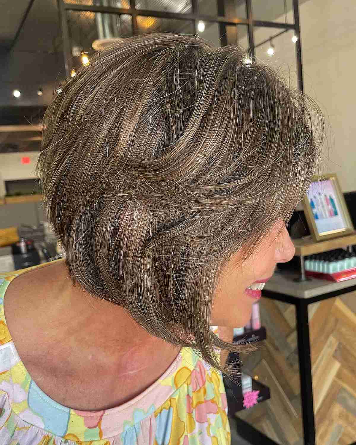 soft inverted bob with feathery layers for an older lady