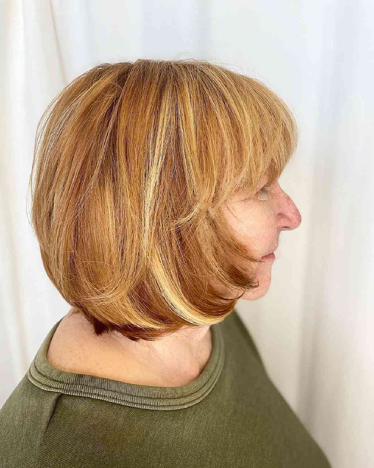 soft textured bob for curvy ladies past their 60s with a fringe