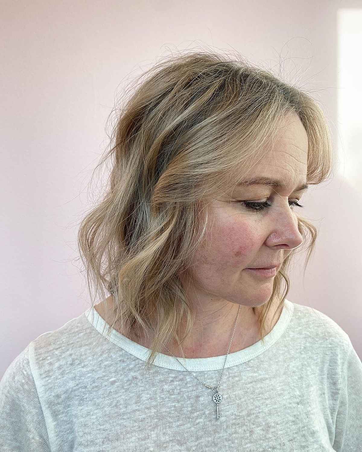 soft tousled medium bob for 60 year old women