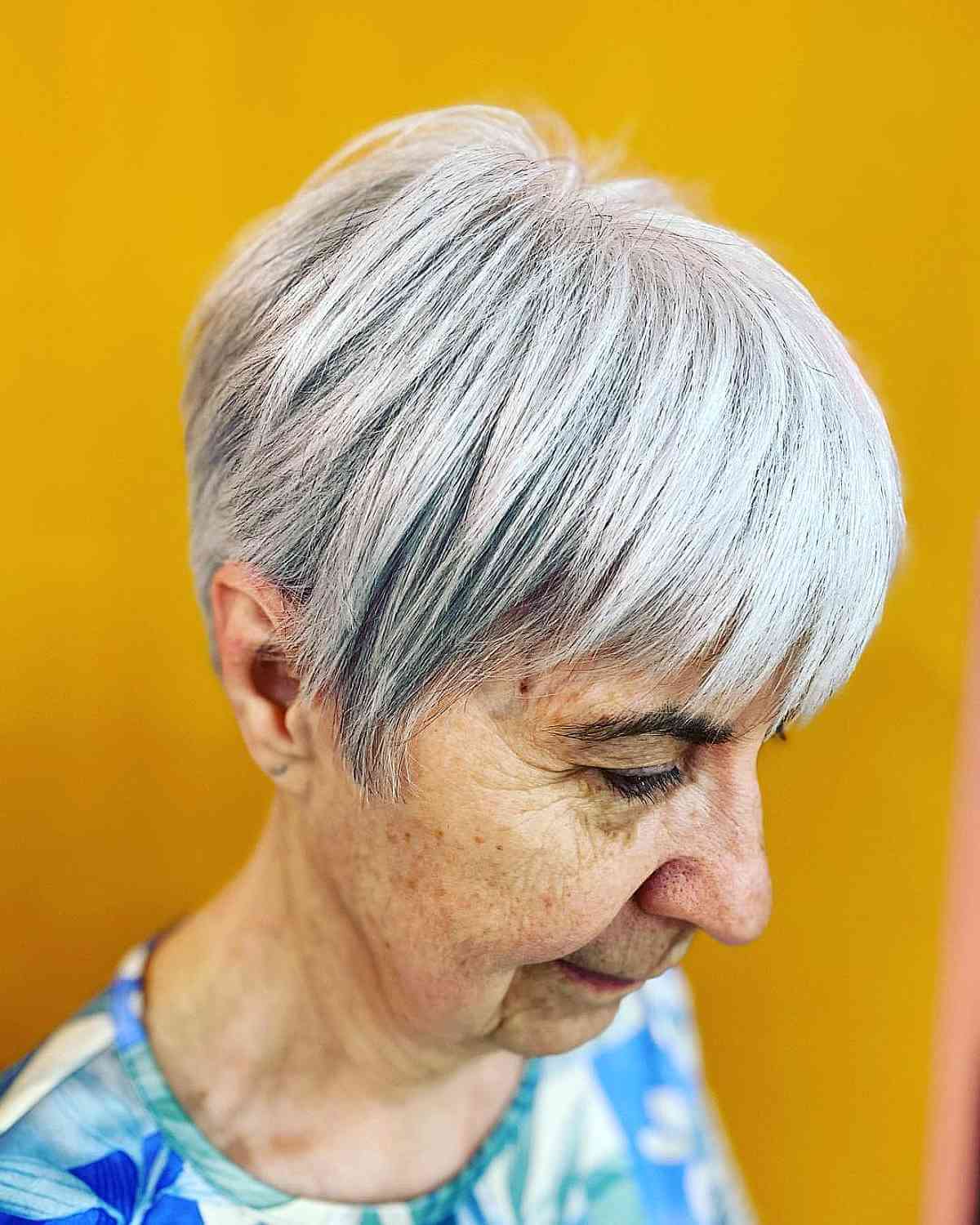 stacked lixie cut on straight hair for a woman over seventy