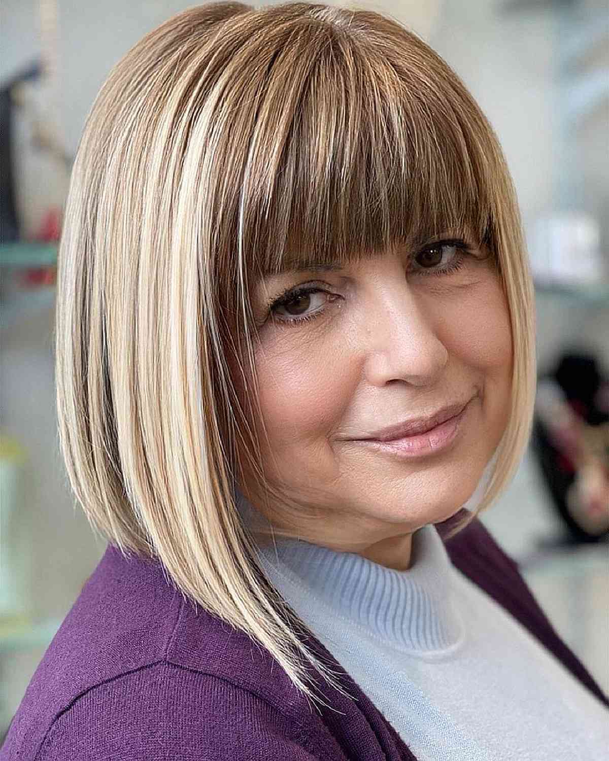 straight bob with full bangs for big ladies passed their 60s with thin hair