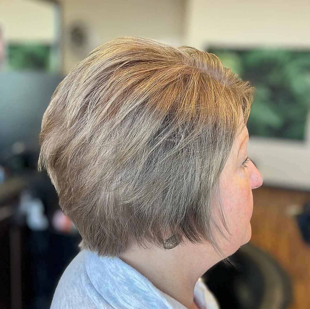 straight pixie bob with wispy layers for women over 60