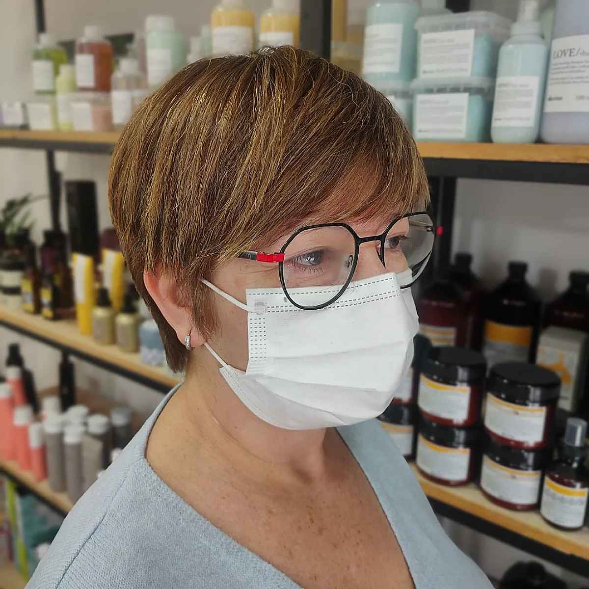 straight pixie with brow length bangs for women aged forty