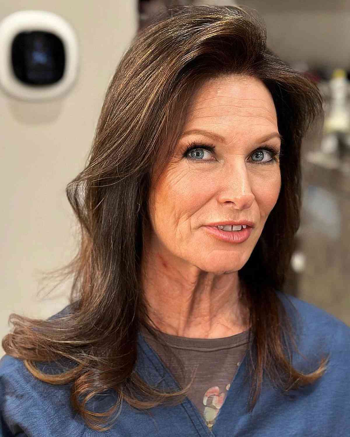 subtle caramel balayage on mid length hair for 60 year olds