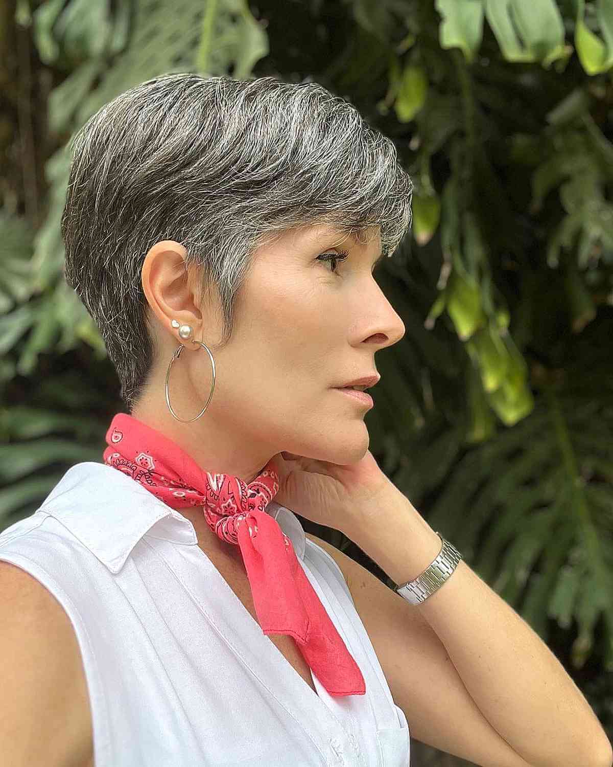 sweet silver pixie with sideburns for a lady over 50