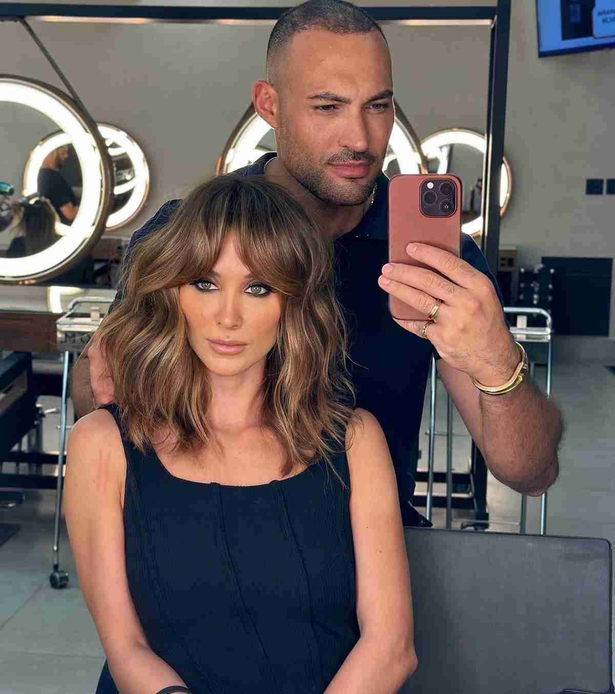 talking with stylist about curtain bangs