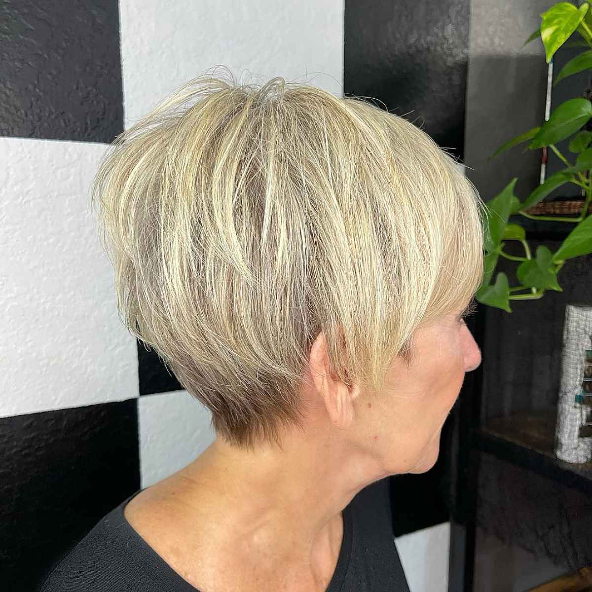 textured pixie bob with stacked layers for ladies aged 60s