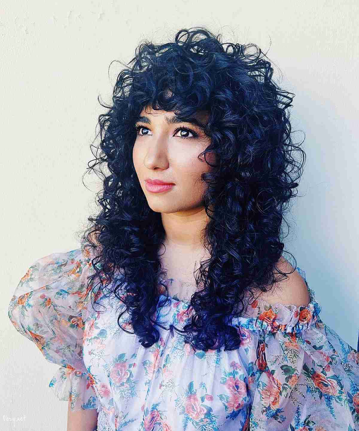 thick jet black shaggy curls