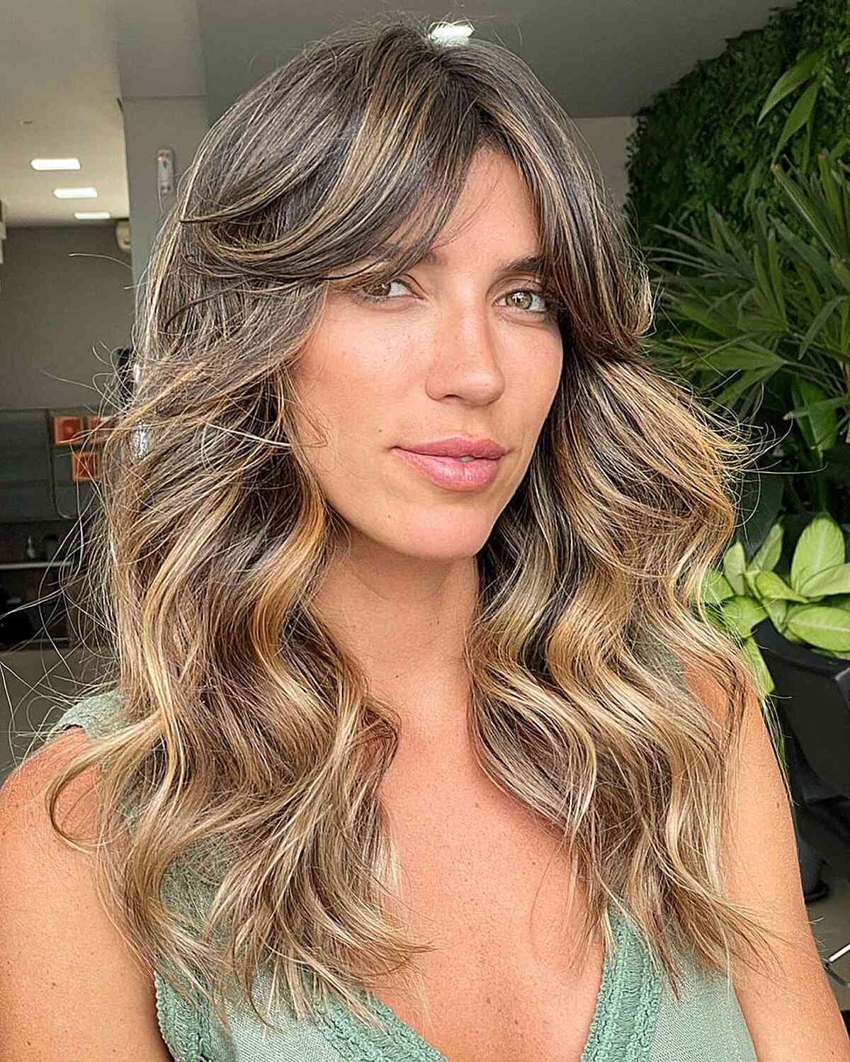 thick long curtain bangs on medium length hair