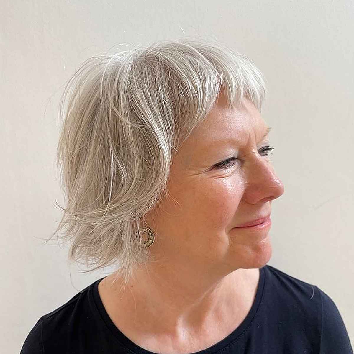 tousled bob with fringe for a woman past 60