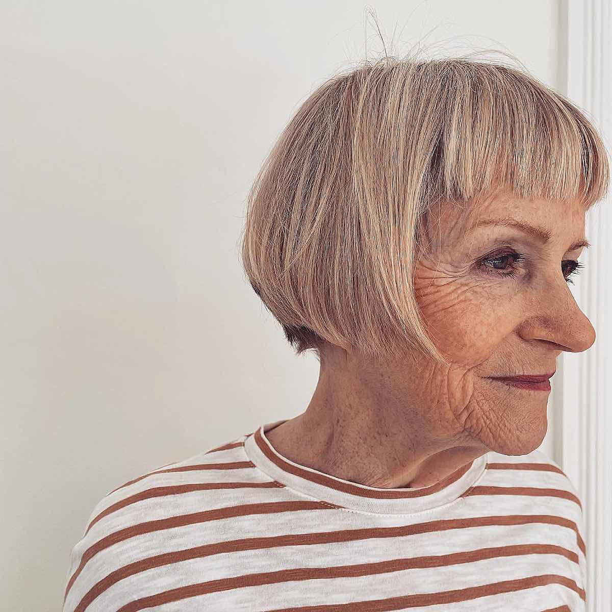 undercut french bob with straight bangs for ladies 70 and over