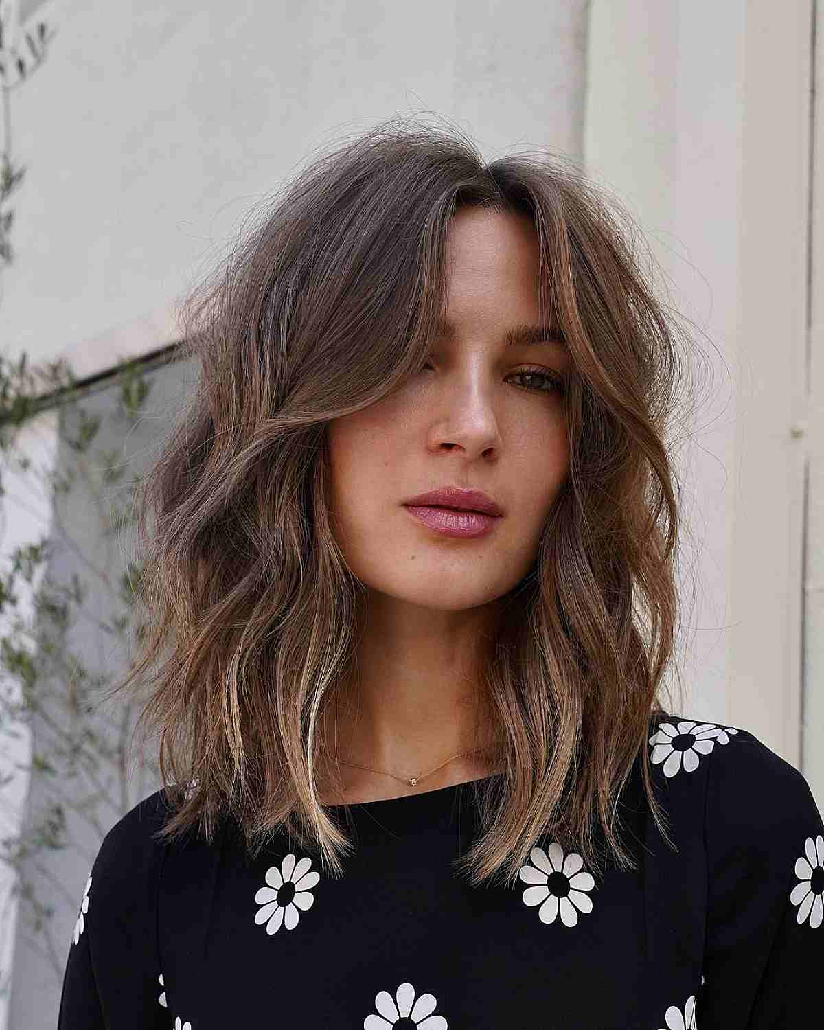 undone chocolate layers and curtain bangs