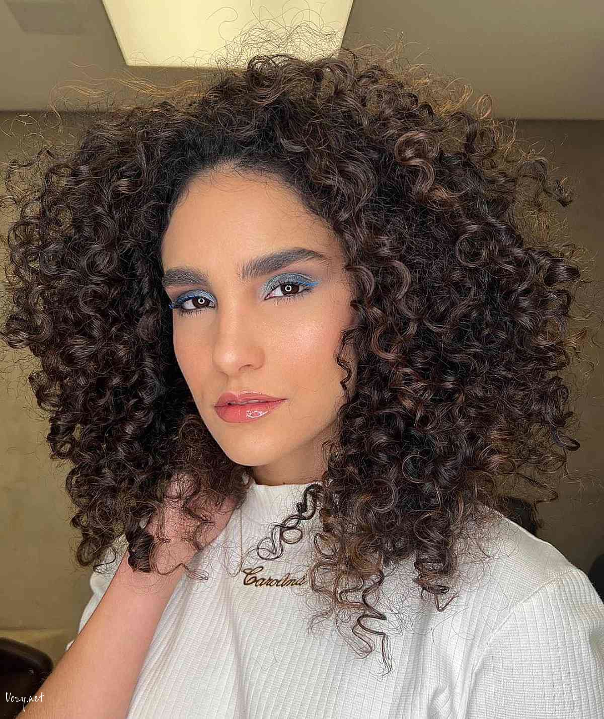 voluminous frizzy layered curls