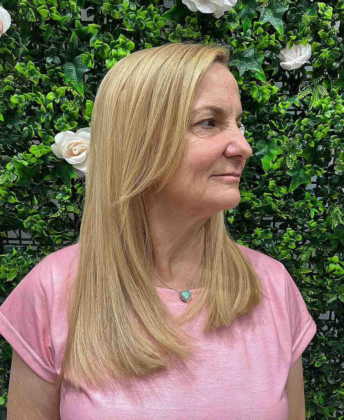 warm honey blonde on straight hair for an older woman