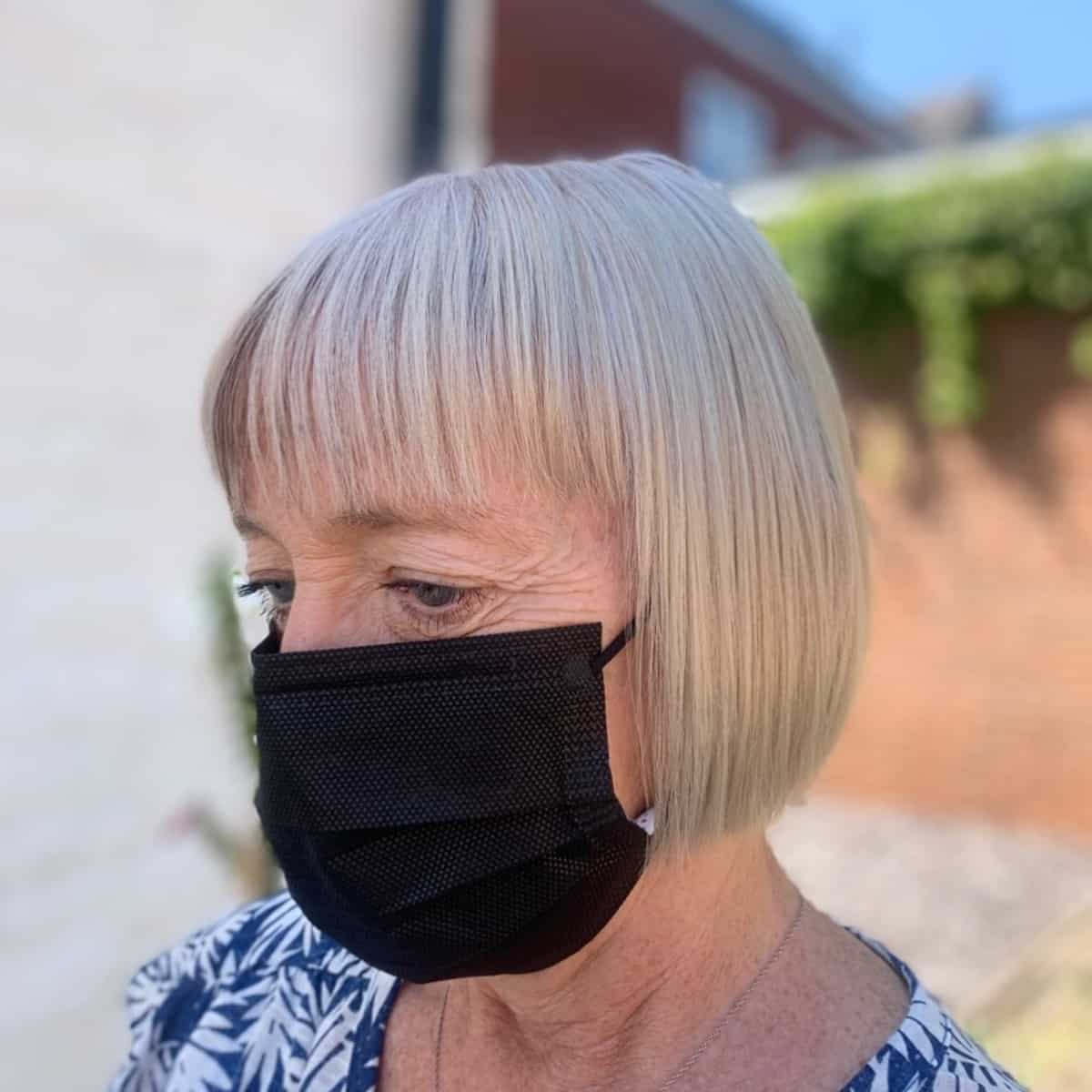 wash and go blunt bob with choppy bangs over 60