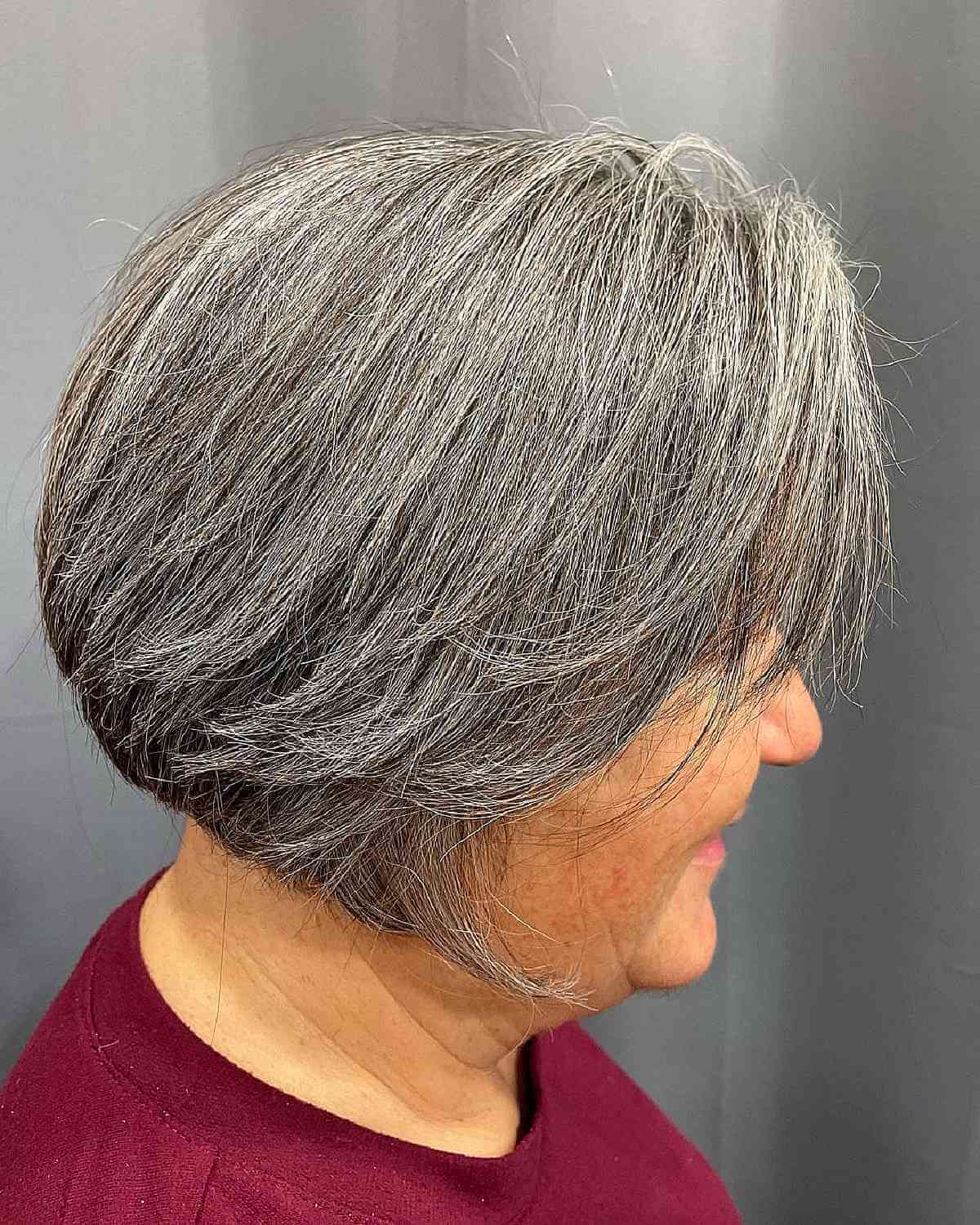 wash and wear inverted bob on gray hair for curvy women aged 60 years old
