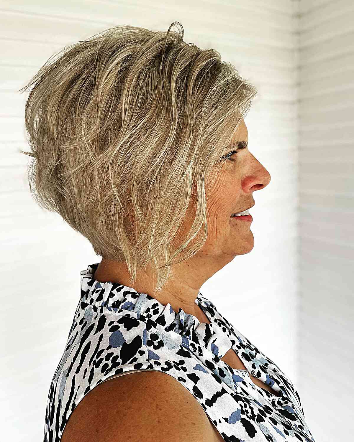 wavy inverted haircut with piecey layers on a short bob for ladies aged 50