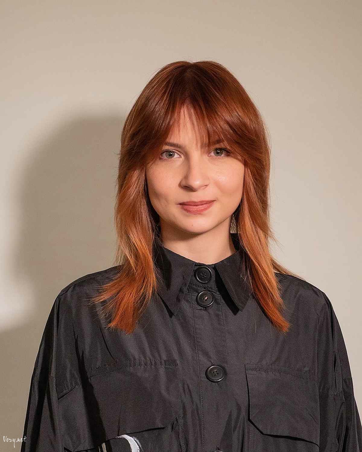 wispy cut with heavy curtain bangs