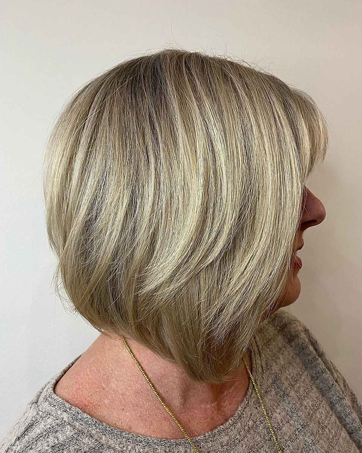 wispy layers on a graduated bob cut for ladies aged sixty